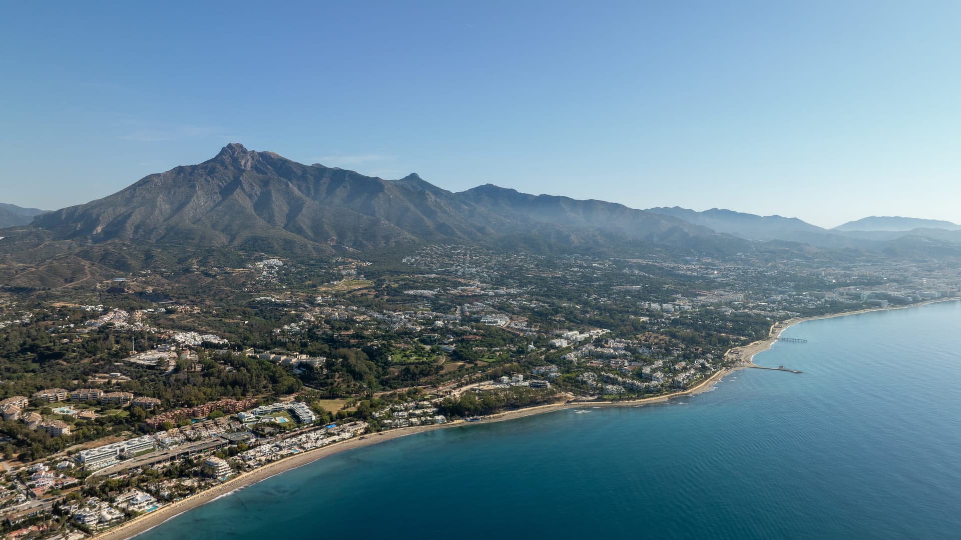 Aerial view of the Golden Mile coastline towards Marbella, with La Concha mountain above